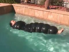 Kinky bound bimbo inflated and thrown in the pool BDSM