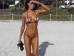 Extreme short bikini cameltoe string on beach